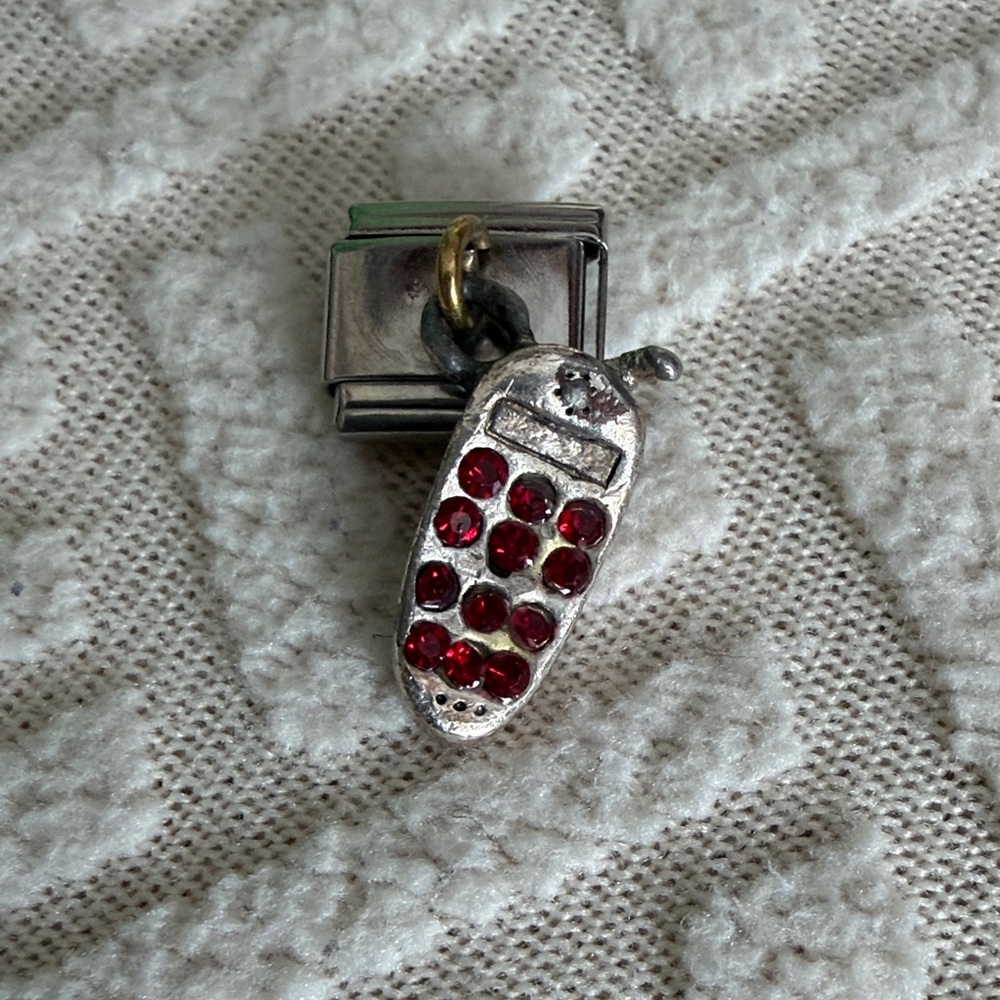 Silver and Red Gemstone Charm